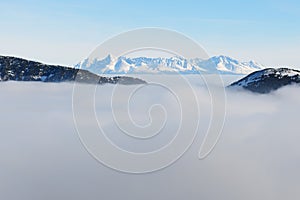 The view on slope and fog in Jasna Low Tatras