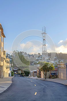 View of sloped residential area below the Sutro Tower in San Francisco, CA