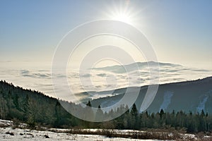 View from Slubica peak during sunrise with inversion mist over the valley