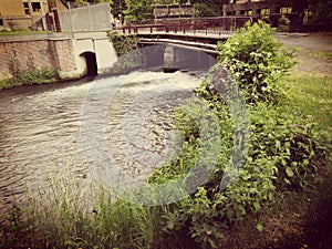 Sluice and bridge in summer