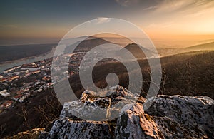 View of a Small City near a River at Sunrise