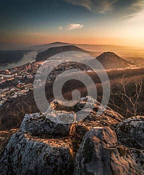 View of a Small City near a River at Sunrise