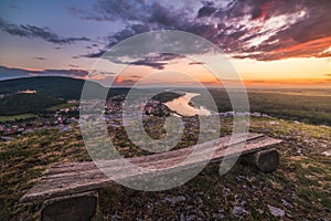 View of Small City with River from the Hill at Sunset