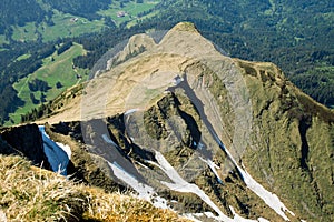 View of the small Klimsenhorn chapel from the top of the mount Pilatus photo