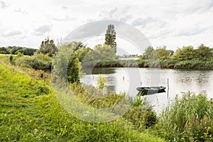 View with a small rowing boat in the water