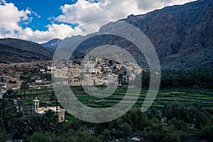 View of the small village Bald Sayt between mountains in Jebel Shams, Oman photo