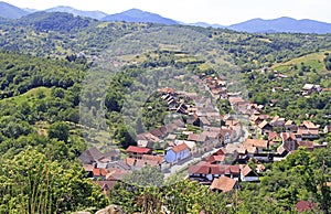 View of small village Cisnadioara from the hill