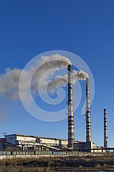 View of smoking coal power plant