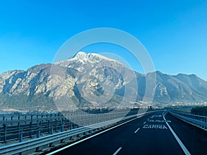View of the snow-capped mountains in Cavazzo Carnico, Italy