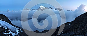 View of snow covered landscape with Weisshorn mountain in the Swiss Alps near Zermatt. Panorama of the Weisshorn near Zermatt