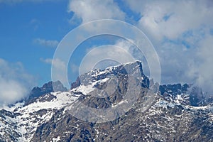 Snowcapped Monte Cinto 2706 masl, the highest mountain on the island of Corsica, France, Europe