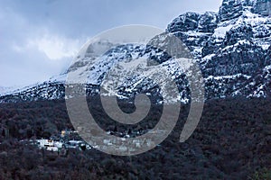 View of the snowed mountains of mikro papigo village of Zagorochoria in Epirus Greece