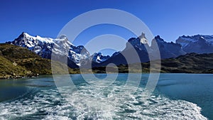 View of the snowy peaks of Torres del Paine from a boat. Patagonia