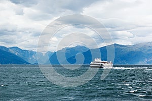 View of Sognefjord with the boat sailing away photo