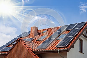 View Of Solar Panels On House Roof Against Clear Sky