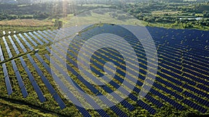 View of a solar power plant, rows of solar panels, solar panels, top view, top view of a solar power plant, industrial background