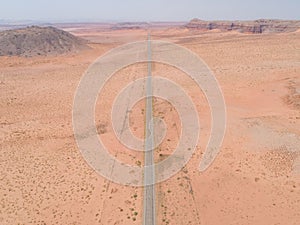 View of a solitary road in Arizona, USA, winding through the desert landscape