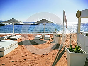 View of some beds in a beautiful beach club in a sand beach in Sharm El Sheikh, Egypt.