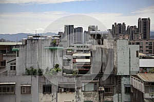 A view of some old buildings under the cloudy sky