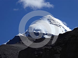View of south face of Mount Kailash, with its distinctive vertical cleft running down the center of the rock face, Tibet