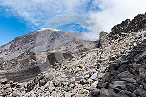 View of the southern face of Mount Kilimanjaro taken from the alpine desert zone on the Machame hiking route