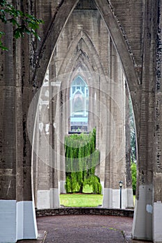 View southwest underneath the St. Johns Bridge and across Cathedral Park in Portland, Oregon, USA