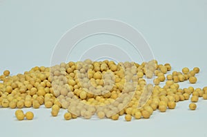 View about soy beans pile on white background