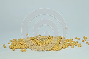 View about soy beans pile on white background