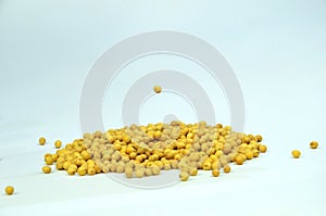 View about soy beans pile on white background