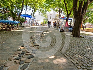 View from Sozopol, Bulgaria. Pedestrian path paved with stone