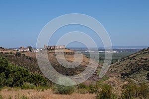 View of the Spanish countryside with an old caste on the hill