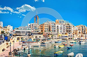 View of Spinola bay with colorful houses and fishing boats. St. Julian`s, Malta, Europa