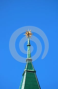 View of spire with a star of the Calvinist church in the SNP square, Bratislava, Slovakia