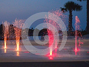 A view of the splash pad. The water jets prented in red and yellow.