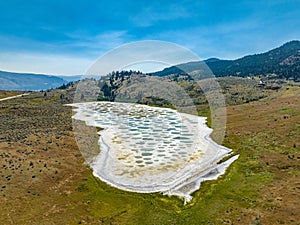 View of Spotted Lake, saline, alkaline lake located in Osoyoos in valley in British Columbia, Canada