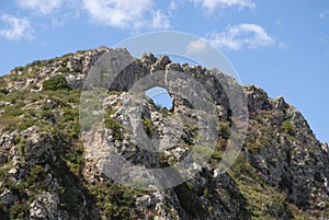 Rock arch in the mountains, Spain photo