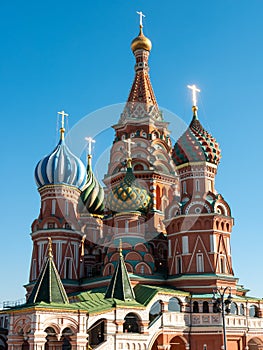 View of St. Basil`s Cathedral against the blue sky. Red Square, Moscow, Russia. Vertical