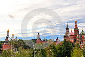 View of St. Basil`s Cathedral and Spasskaya tower of Kremlin on Red Square in Moscow, Russia