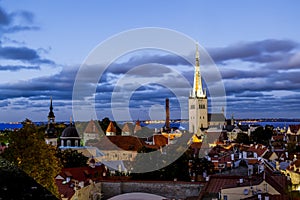 View of the St. Olaf Cathedral in old Tallinn at sunset . Eston