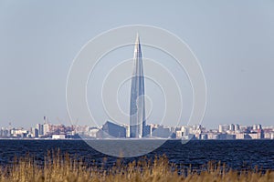 View of St. Petersburg through the Gulf of Finland. Gazprom City Tower in the center photo