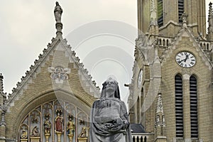 View of the St. Stephen`s Basilica in Budapest. The majestic catholic cathedral on cloudy sky background