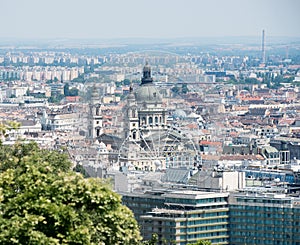 View of St. Stephens Basilica Big dome and Ferris wheel in Budapest