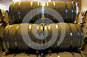 View of stacked casks at a whisky distillery in a row at the storage
