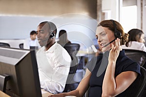 View Of Staff In Busy Customer Service Department