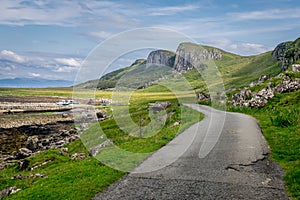 A view of Staffin island and Staffin harbour. Garrafad bay and An Corran Beach. A road to Kilt Rock