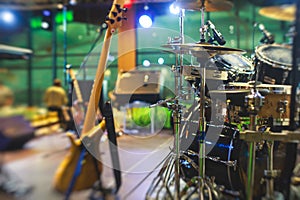 View of stage during rock-concert, with musical instruments and scene stage lights, rock show performance, before the performance,