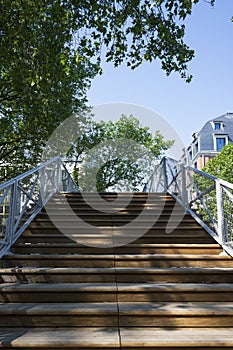 Pedestrian bridge over the Saint-Martin canal in Paris photo