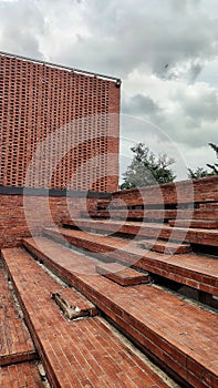 the view of the stairs with red brick material arranged neatly, looks classic and elegant