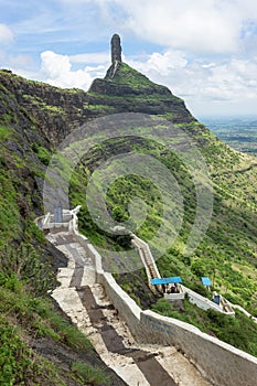 View of stairs and Tungi hill rock, Mangi Tungi, Nashik, Maharashtra, India. photo