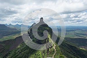 View of stairs and Tungi hill rock, Mangi Tungi, Nashik, Maharashtra, India. photo